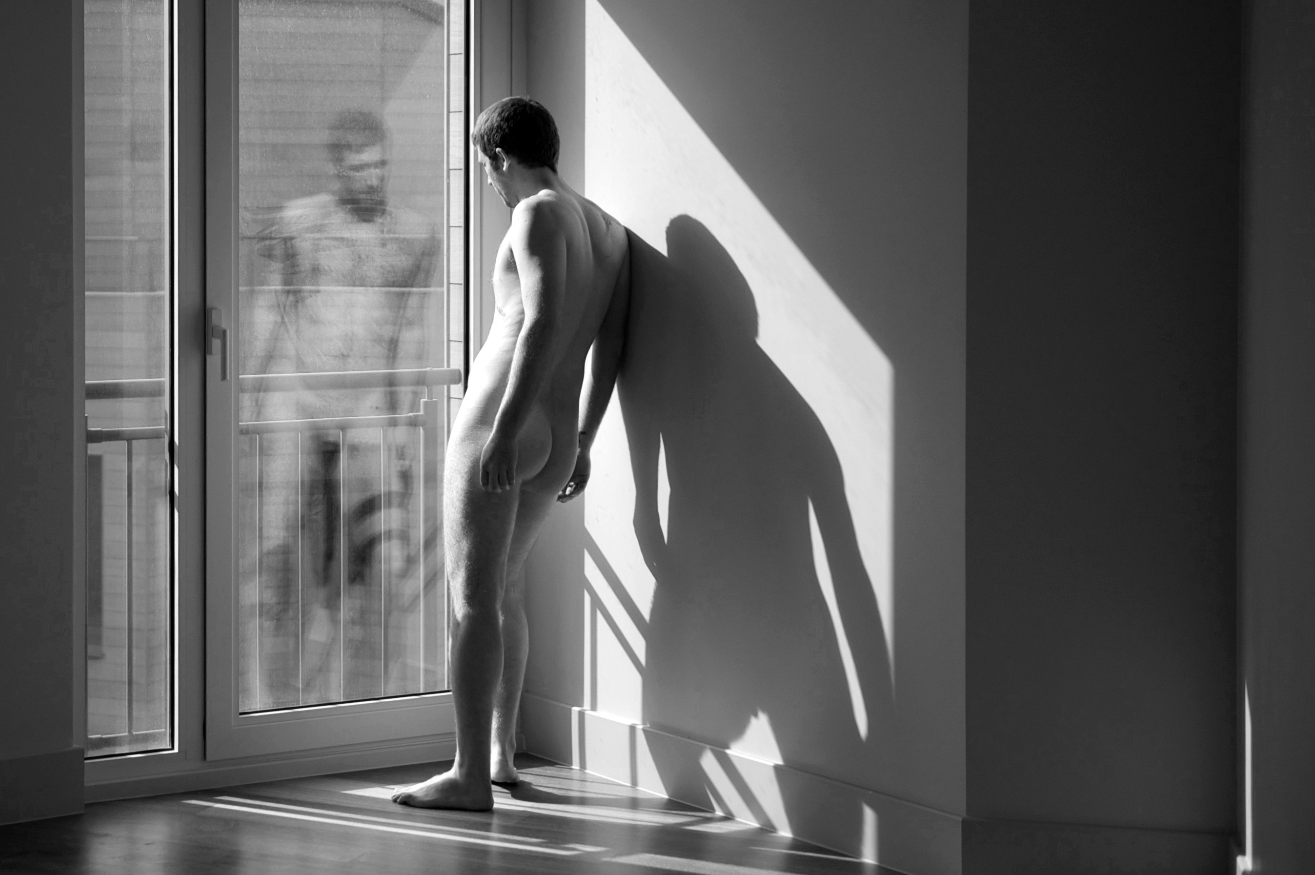 Naked by window light photograph by wolfgang madison.